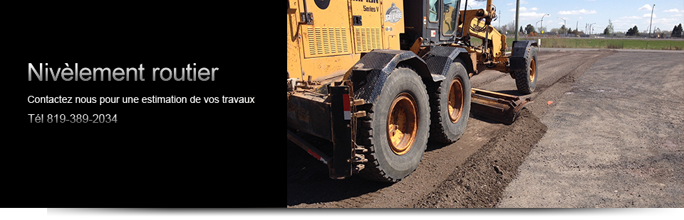Travaux de nivèlement routier à Victoriaville
